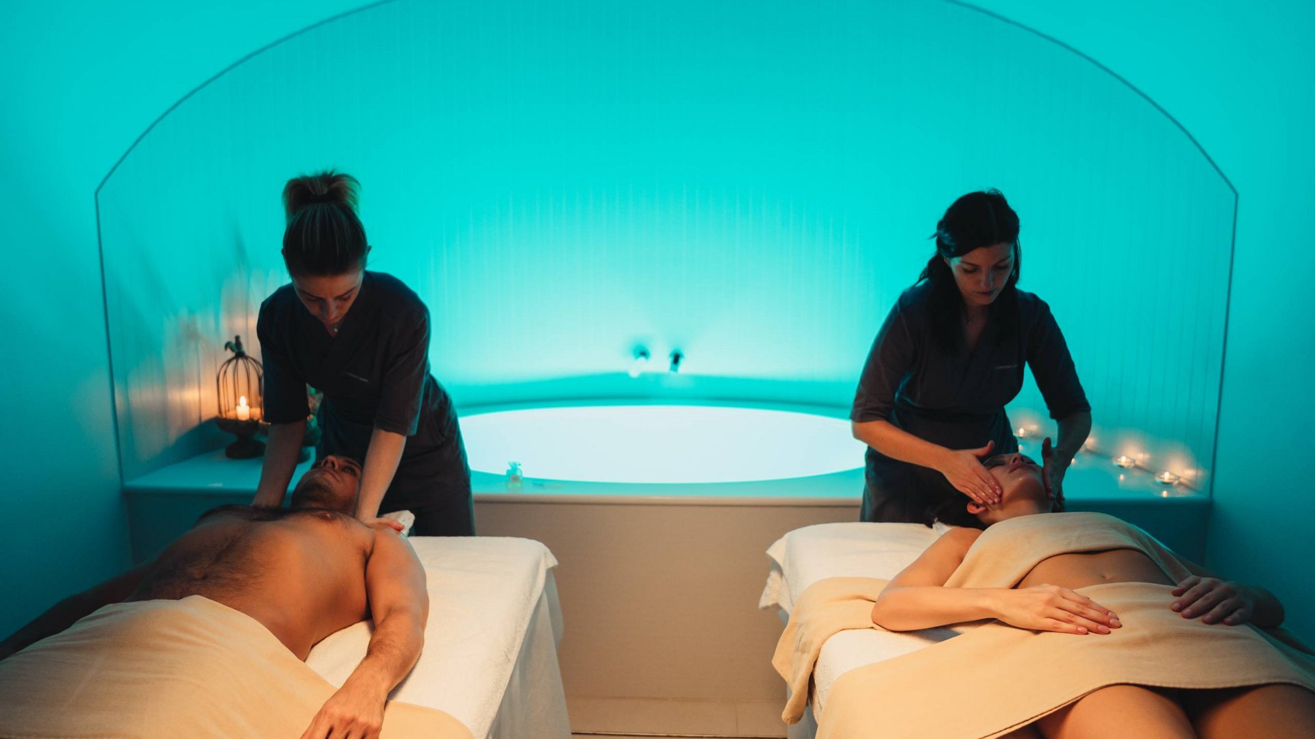 Unparalleled wellness in Umbria Couple receiving relaxing massages in a calm spa setting